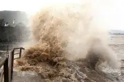 Typhoon Bavi Weakens but Lashes China with Strong Winds and Rain